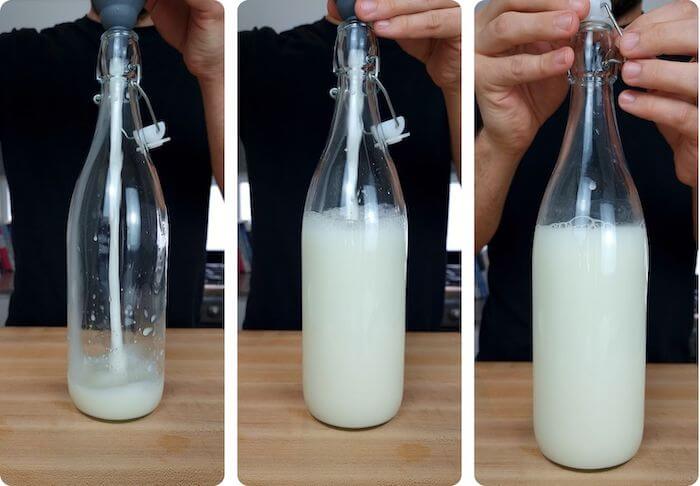 oat milk being poured into bottle