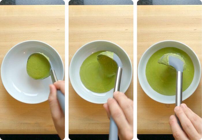 fresh avocado soup being served in a bowl