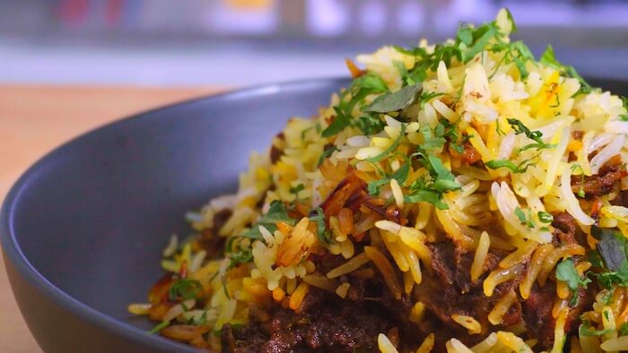 close up of plated chicken biryani dum