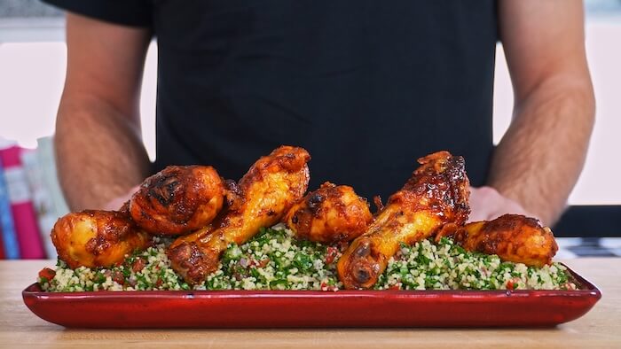 chicken served on top of tabbouleh salad