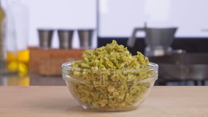 green rice served in a bowl 