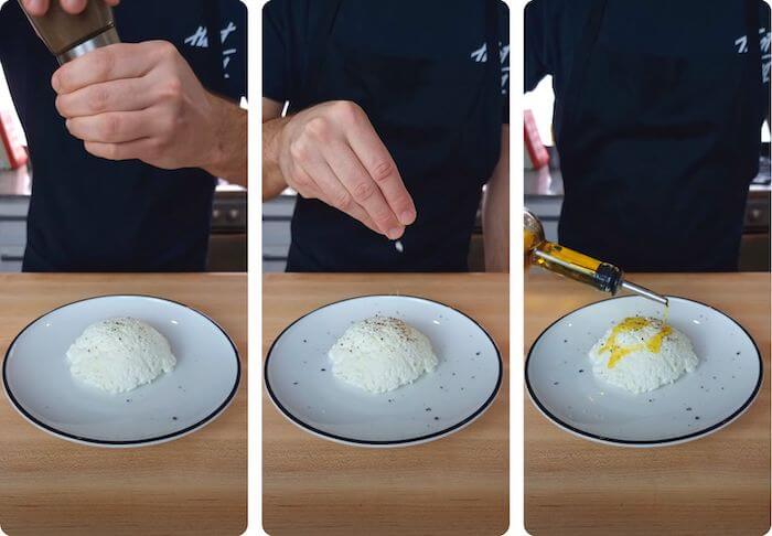 ricotta cheese on a plate being seasoned