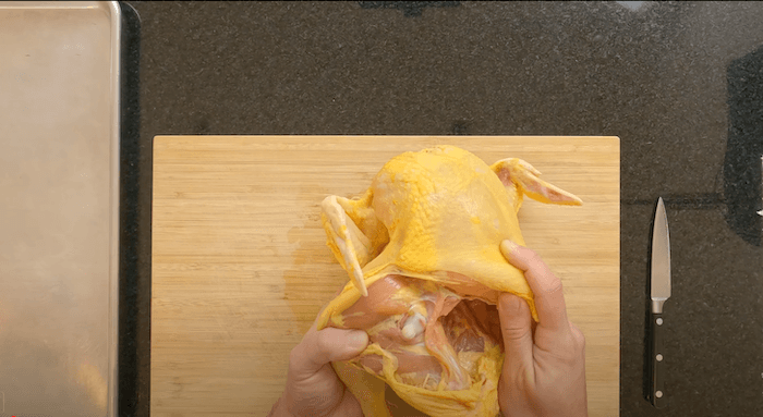 preparing a chicken thigh