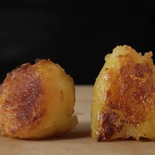 2 roast potatoes, a floury russet and a waxy alpha