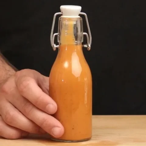 A bottle of tomato and garlic dressing