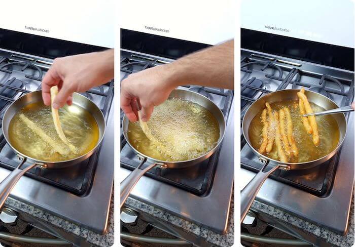 potato being fried in hot oil