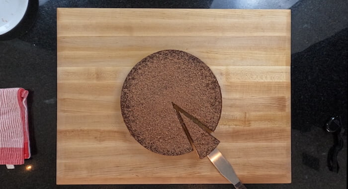 overhead shot of portion of tart being taken with a dessert slice