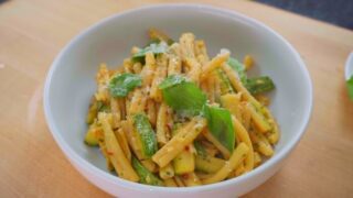 bowl of zucchini pasta with basil