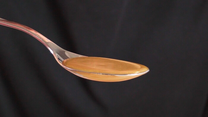 spoon full of chicken pan sauce