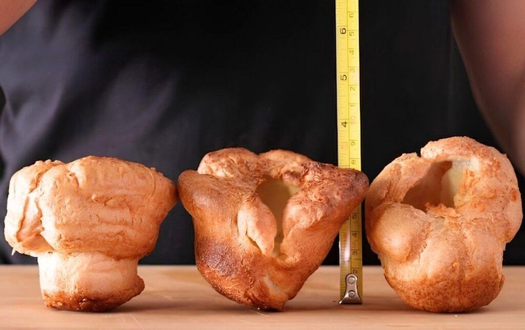 tall Yorkshire puddings being measured for height