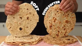 me holding 2 soft flat breads