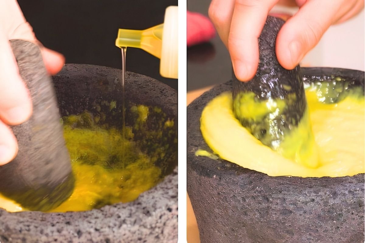 Two step photos of oil being added to egg yolks in a stone mortar and pestle as the mixture thickens into aioli