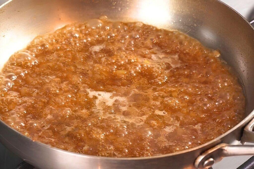 cider and leek pork sauce reduced in frying pan