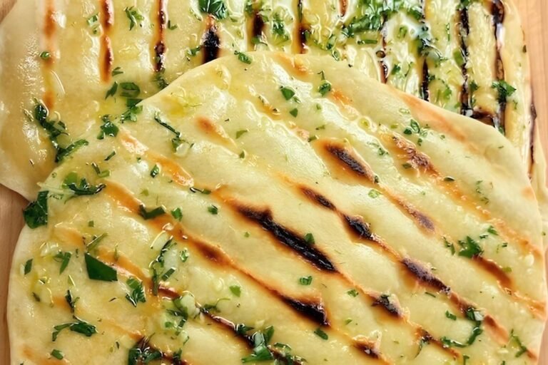 Grilled flatbread brushed with herb butter