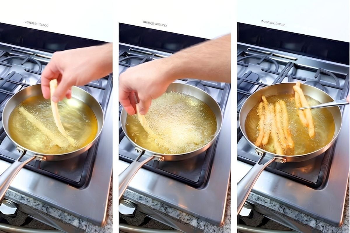 Hands frying golden fries in hot oil, demonstrating the cooking process for a delicious fries recipe.