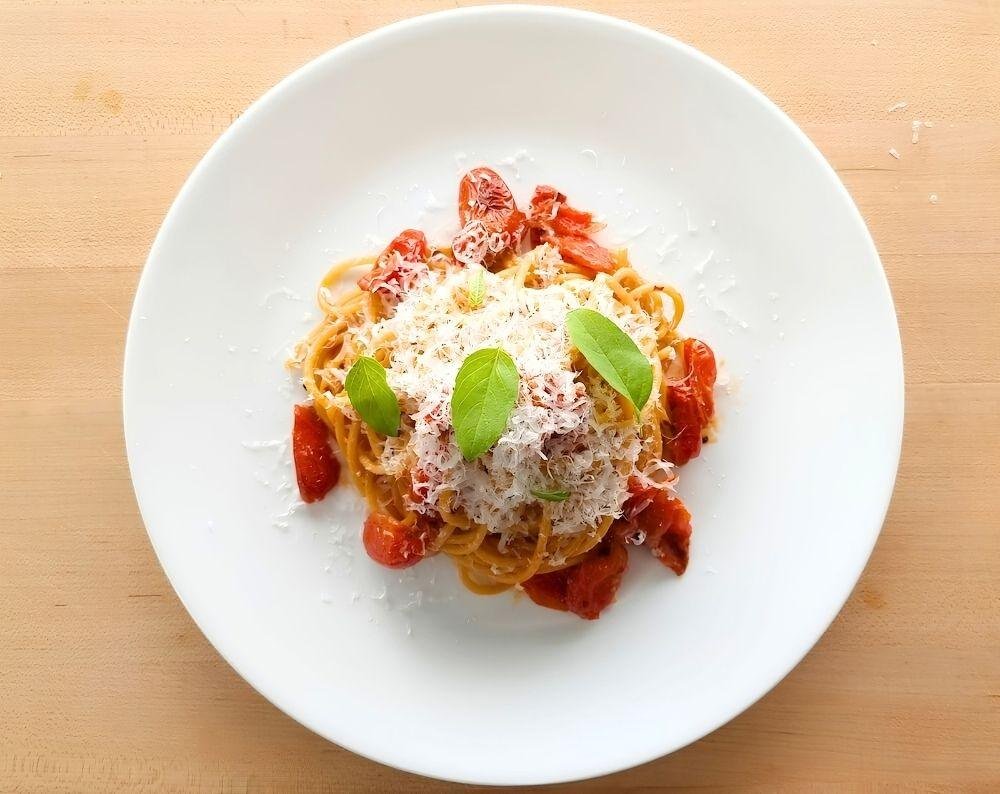 Plate of scarpariello pasta on a chopping board