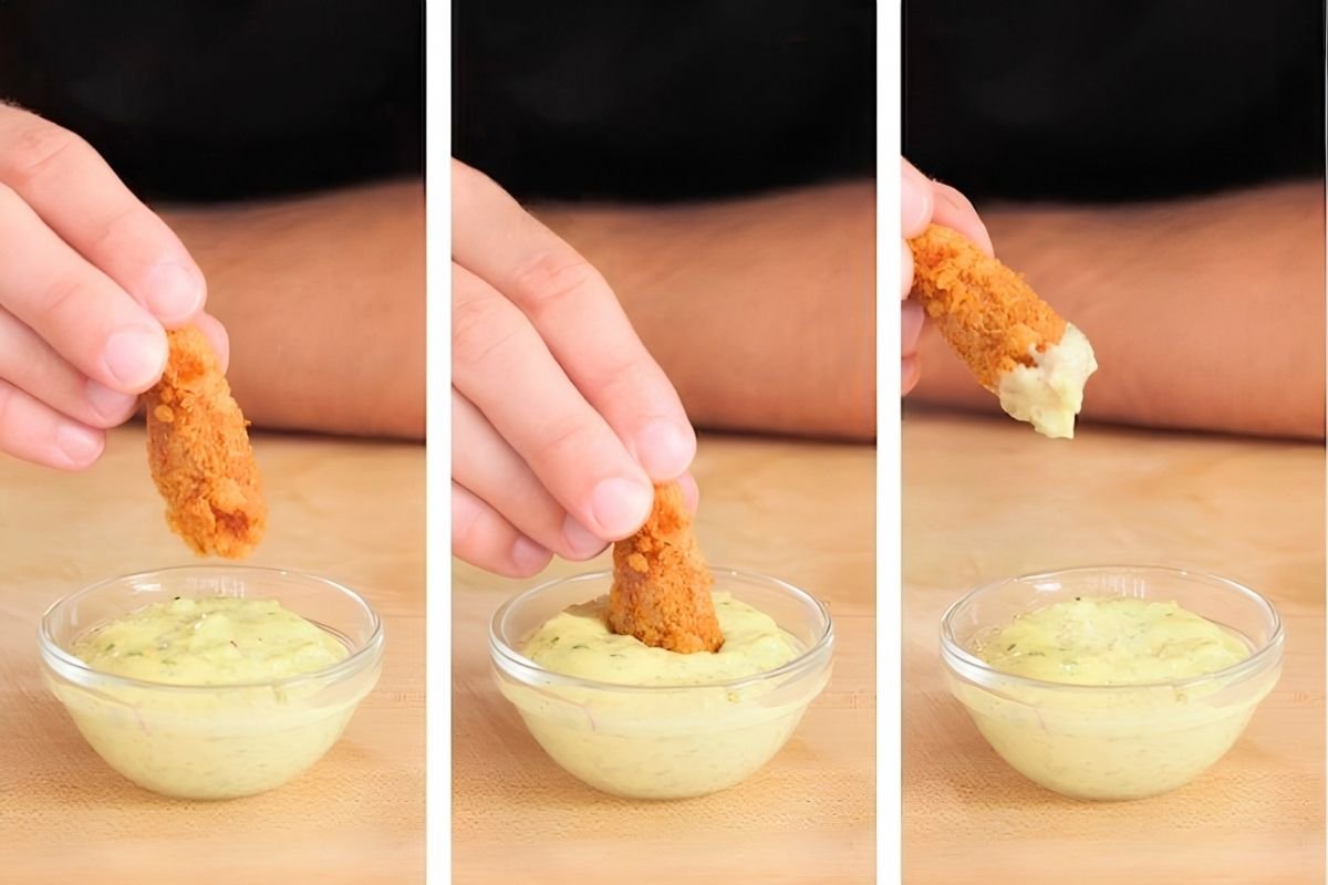 Three step photos of a crispy chicken strip being dipped into homemade tartar sauce