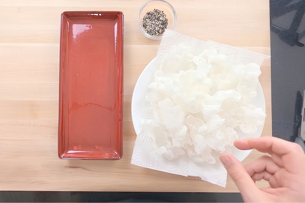 Plate of fried vegan prawn crackers made from rice paper
