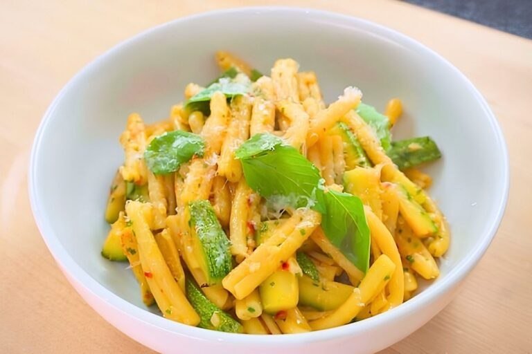 bowl of zucchini pasta with basil